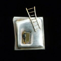 5.40 'Moving Up' 1991. Brooch; white metal, gold plating