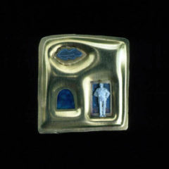 5.43 'Blue Remembered Hills' 1991. Brooch; white metal (gold plated), enamel