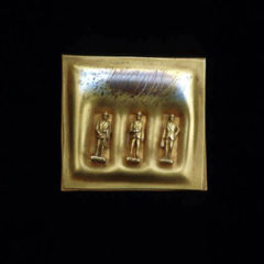 5.45 'Life in the City' 1992. Brooch; white metal, gold plated and oxidised