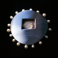 5.93 'A Moment in Time' 2000. Brooch; white metal, cultured pearl, antique crystal