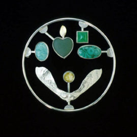 6.10 'Love Kit' 2001. Brooch; white metal, malachite, agate, Iona marble