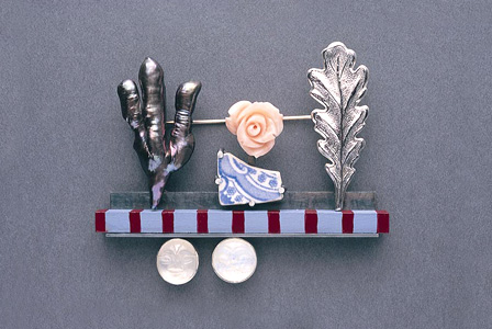 7.2 'In The Garden' 2003. Brooch; white metal, wood, paint, moonstone, cultured pearl, coral, found object