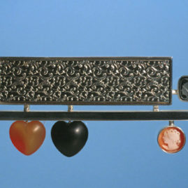 'Together & Alone' 2003. Brooch; white metal, onyx, carnelian, cameo, hematite