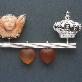 7.38 'Your Love is King' 2003. Brooch; white metal, coral, carnelian